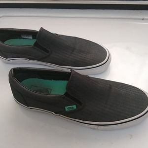 Gray Vans slip-ons